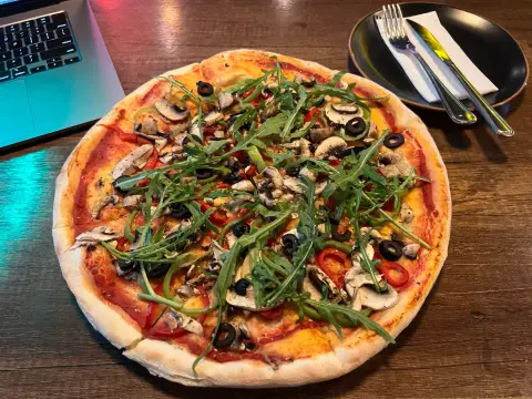 Arugula Mushroom Pizza, cooked by Ely